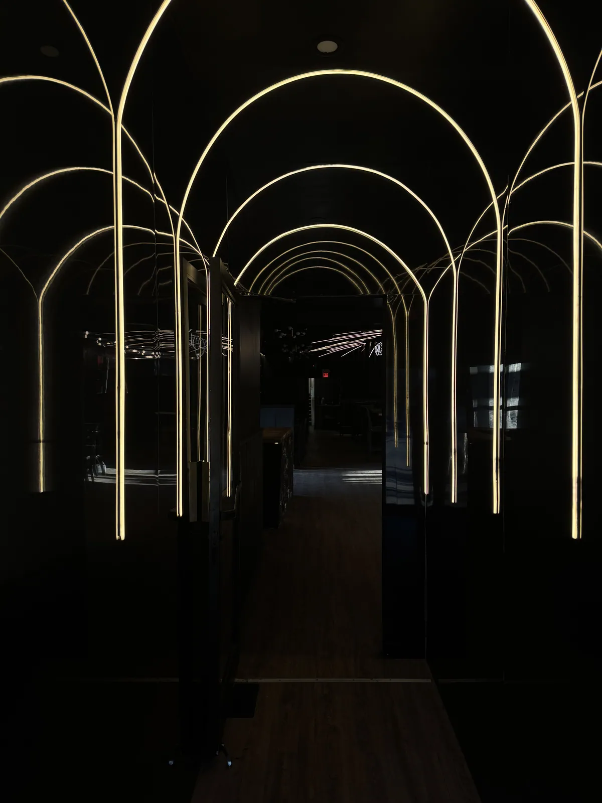 The illuminated entrance to Début's dining room